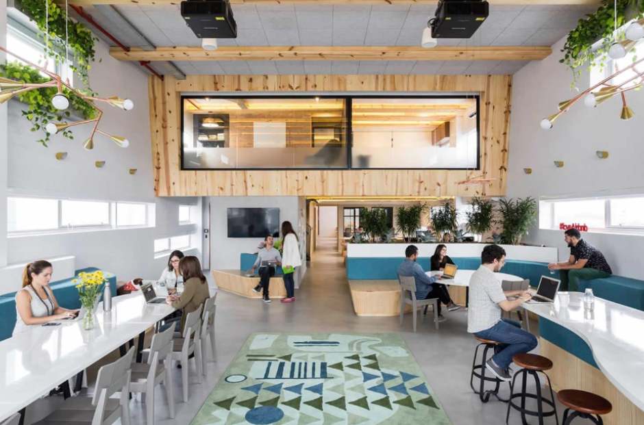Airbnb workspace with integrated desks and minimalist space.