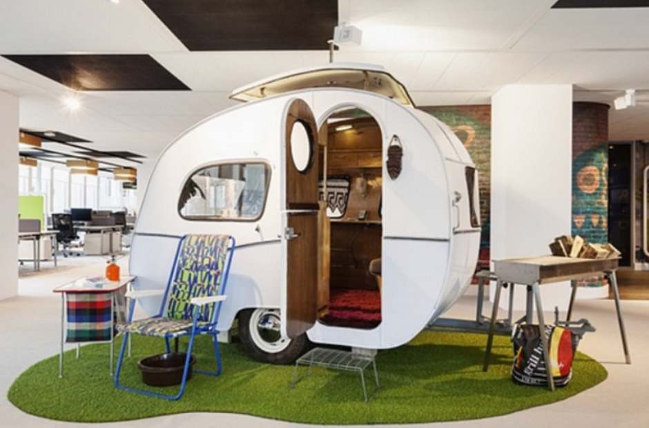 Mini trailer with camp-style atmosphere as decompression space inside Google's Amsterdam office.